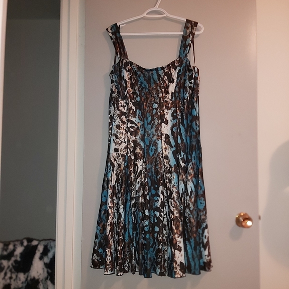 Frank Lyman Design Dresses & Skirts - Beautiful teal leopard print dress.